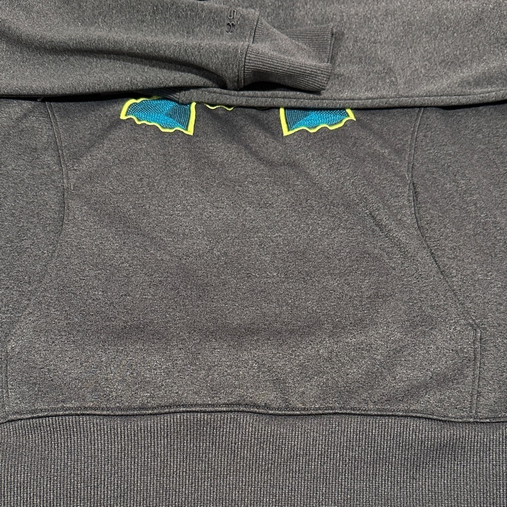 Under Armour Storm Semi Fitted Charcoal Gray Hoodie with Blue and Yellow logo. - Picture 7 of 7